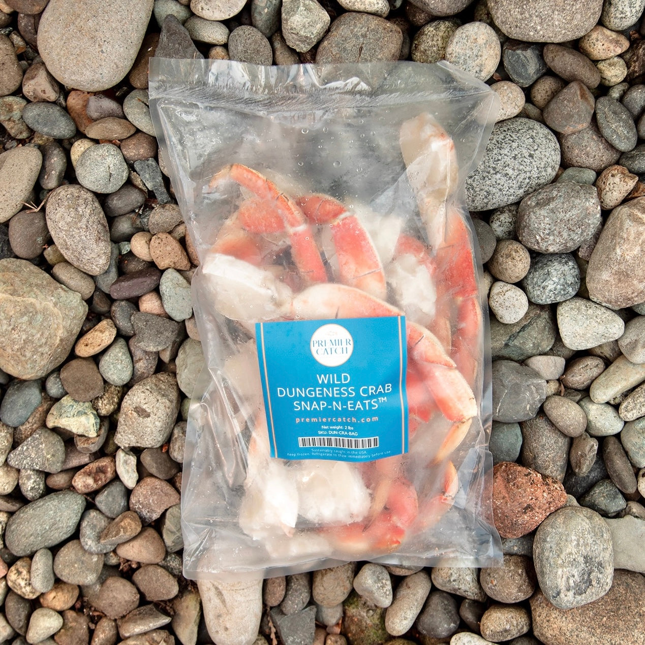 Premier Catch wild Alaskan Dungeness crab legs sealed in retail packaging