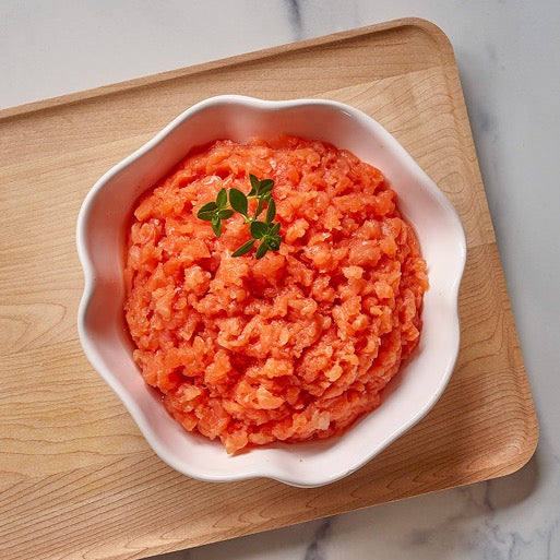 Wild Alaska coho salmon burger meat in a bowl ready for cooking.